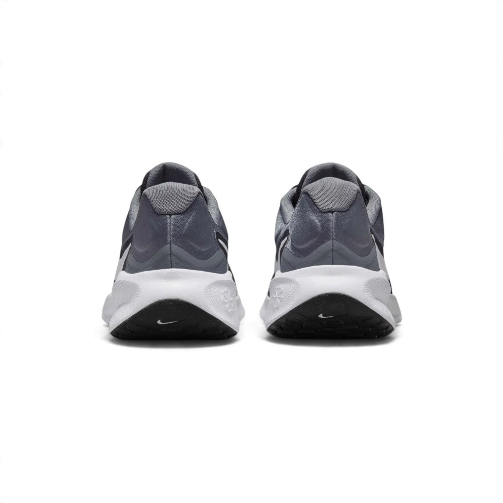 Rear view of the sneakers emphasizing the reinforced heel structure, supportive rear padding, and ground contact sole wrap.