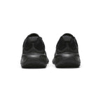 Focuses on the rear profile, displaying the visible external Achilles heel puffs, supportive heel structure, and the wide flared base of the foam midsole.