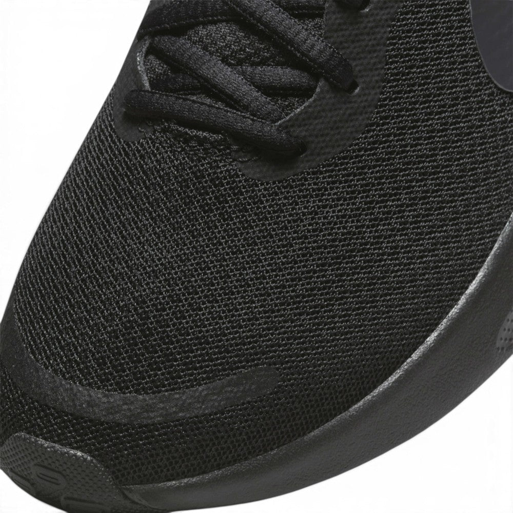 Details the micro-precision of the forefoot area, showing the open-weave black mesh toe box, bonded protective overlay strip, flat laces, and wider toe profile.