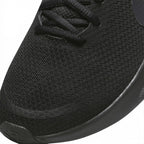 Details the micro-precision of the forefoot area, showing the open-weave black mesh toe box, bonded protective overlay strip, flat laces, and wider toe profile.