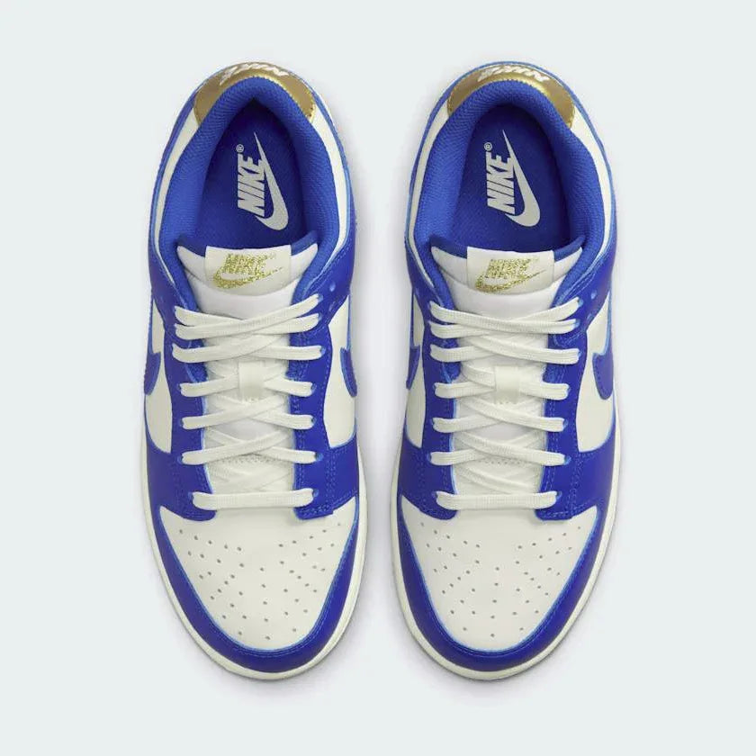 Nike Dunk Low Women's White Leather Trainers FB7173-141 top view showing padded tongue, laces, and perforated toe box
