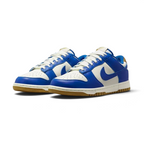 Nike Dunk Low Women's White Leather Trainers FB7173-141 angled view showing colour-blocked overlays and retro basketball silhouette