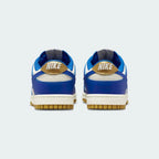 Nike Dunk Low Women's White Leather Trainers FB7173-141 back view showing embroidered Nike logo and heel tab