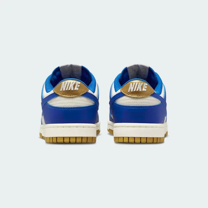 Nike Dunk Low Women's White Leather Trainers FB7173-141 back view showing embroidered Nike logo and heel tab
