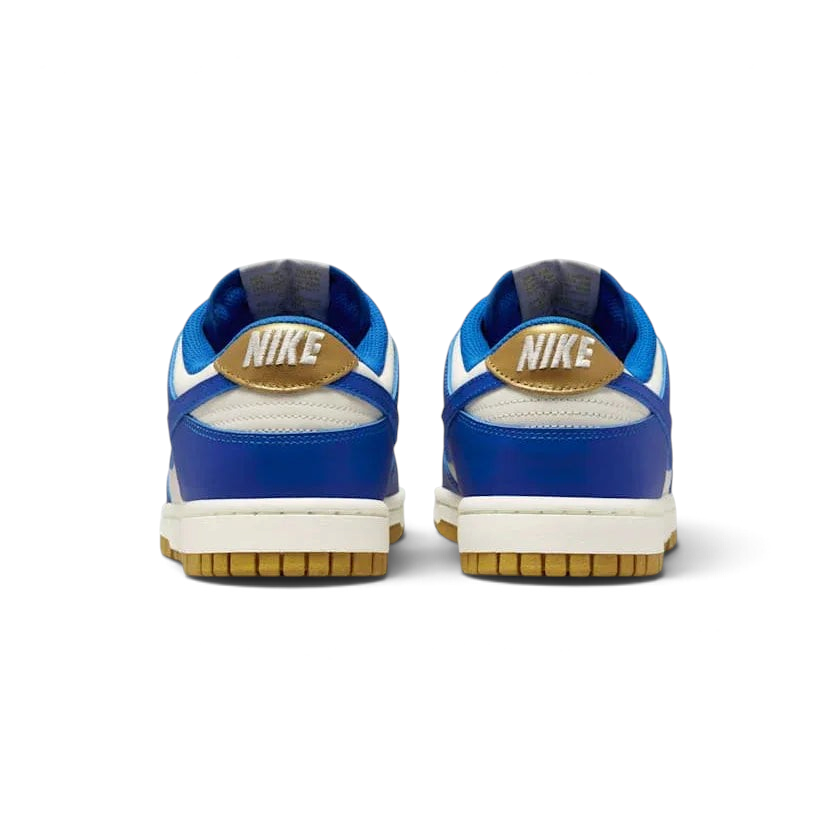 Nike Dunk Low Women's White Leather Trainers FB7173-141 back view showing embroidered Nike logo and heel tab