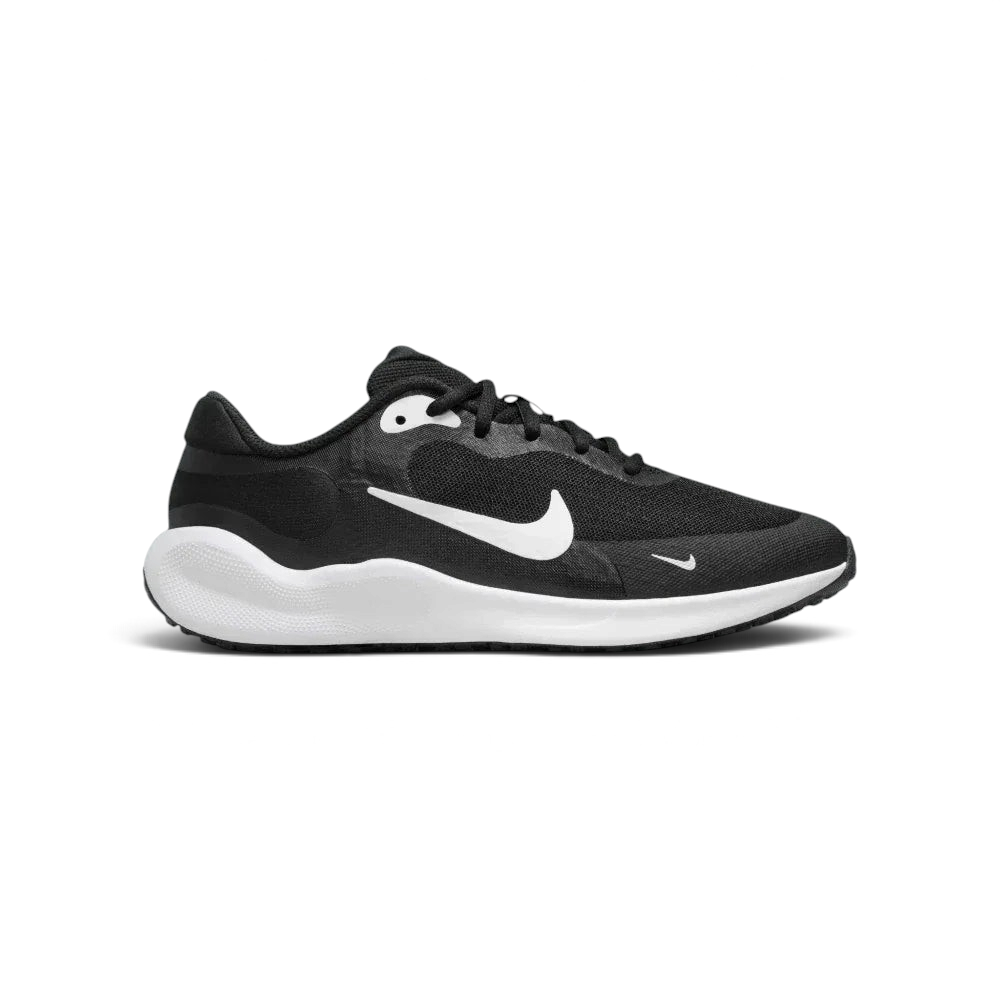 Side profile of the Nike Revolution 7 Juniors in Black, featuring the large white Swoosh and the clean, contoured white foam midsole.