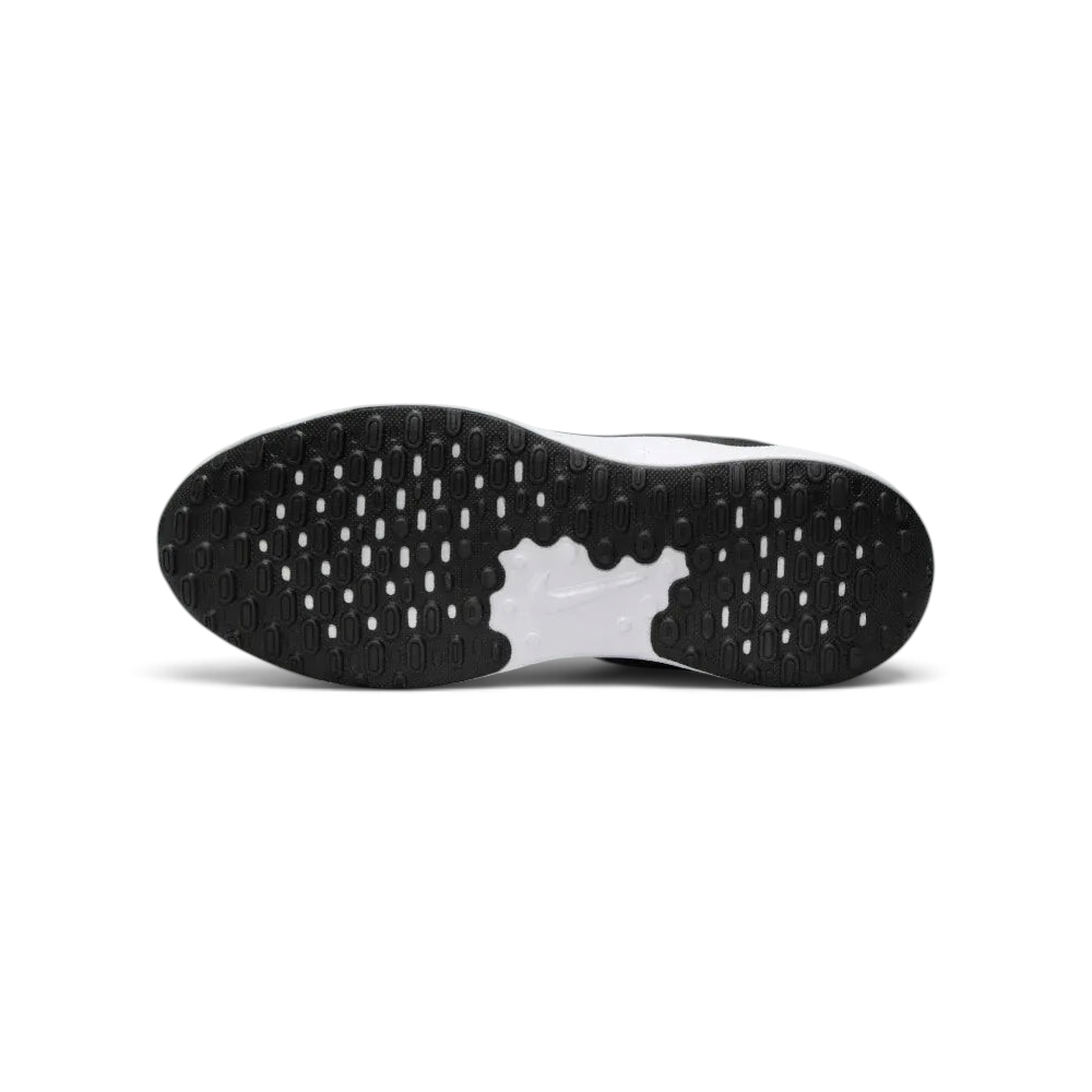 View of the black rubber outsole, showcasing the updated traction pattern and flexible grooves for a natural stride.