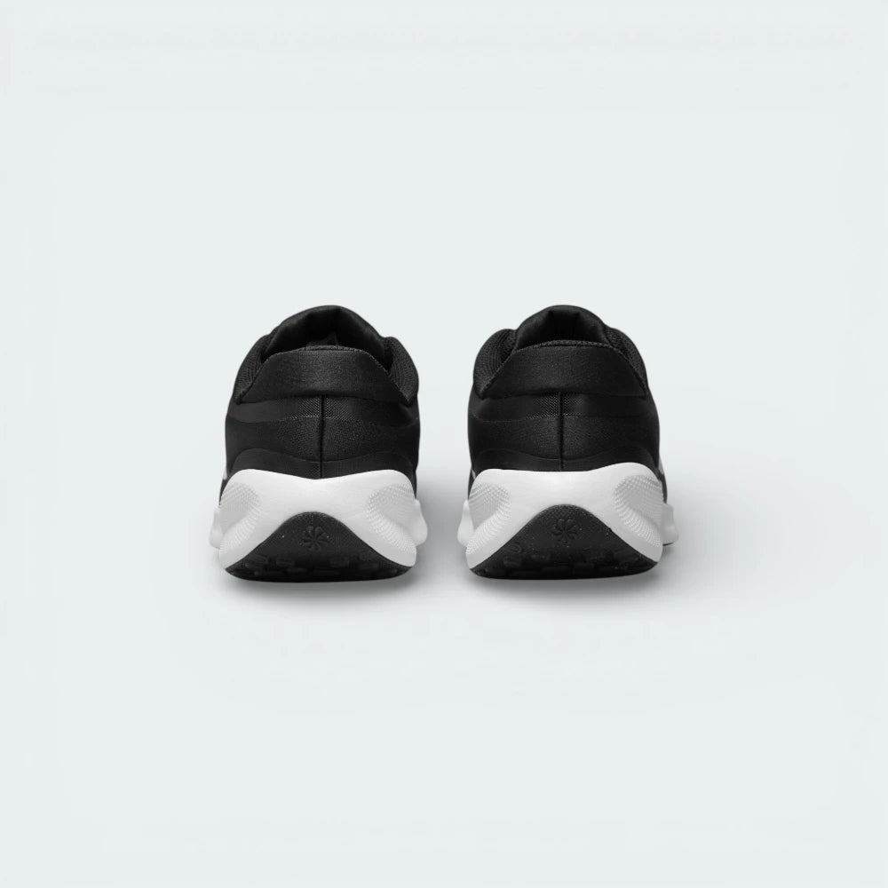 Rear view focusing on the structured black heel support and the padded ankle collar for extra comfort.