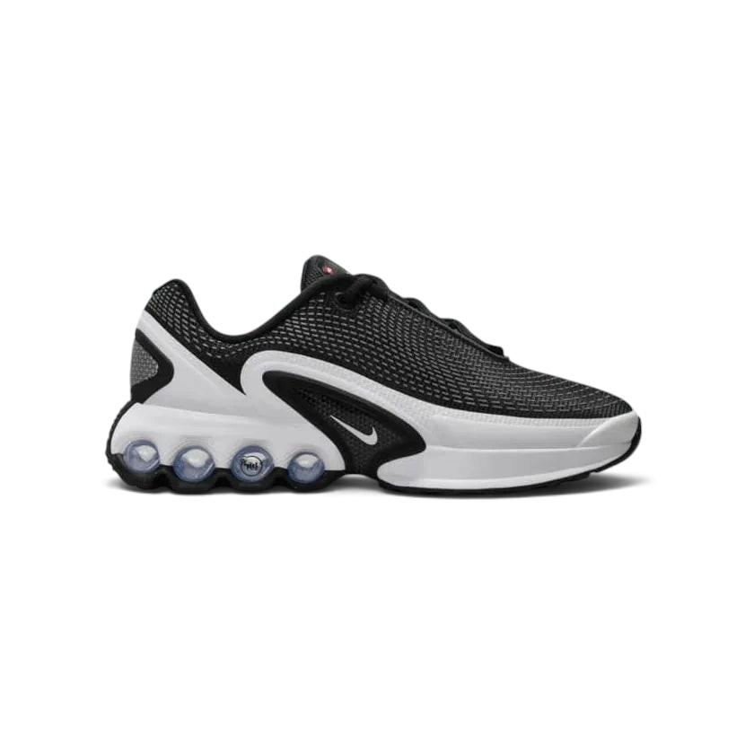 Nike Air Max DN Juniors Casual Trainers FB8987-003 side view showing sleek black upper and visible Air cushioning Main image