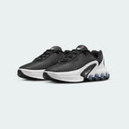 Nike Air Max DN Juniors Casual Trainers FB8987-003 angled view showing layered textures and sculpted midsole