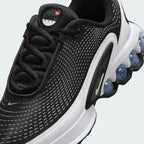 Close-up of Nike Air Max DN Juniors Casual Trainers FB8987-003 laces, mesh upper, and branding