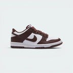 Highlights the high-velocity sweep of the vibrant Gym Red leather Nike Swoosh, showing the professional, smooth matte texture of the White leather base panels, the deep Redwood overlays, and the clean white rubber midsole wall.