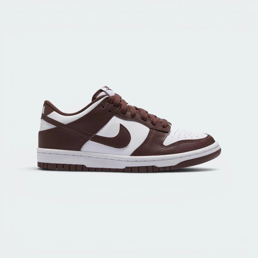 Highlights the high-velocity sweep of the vibrant Gym Red leather Nike Swoosh, showing the professional, smooth matte texture of the White leather base panels, the deep Redwood overlays, and the clean white rubber midsole wall.
