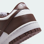 Highlights the "unreal" clean finish where the high-walled rubber cupsole midsole bonds securely to the tough leather upper framework.