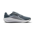 Displays the full lateral silhouette featuring the breathable Cool Grey mesh upper, outlined White Nike Swoosh, thick white sculpted foam midsole, supportive Wolf Grey eyelet overlays, and durable black rubber outsole rim.