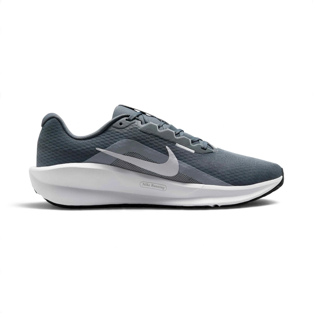 Inner side profile of the Nike Downshifter in grey featuring the white tick