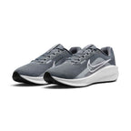 Forward three-quarter angle showcasing both shoes side by side, highlighting the modern rocker running stance, streamlined toe spring, clean white Swoosh contrast, and balanced foam midsole stack height.