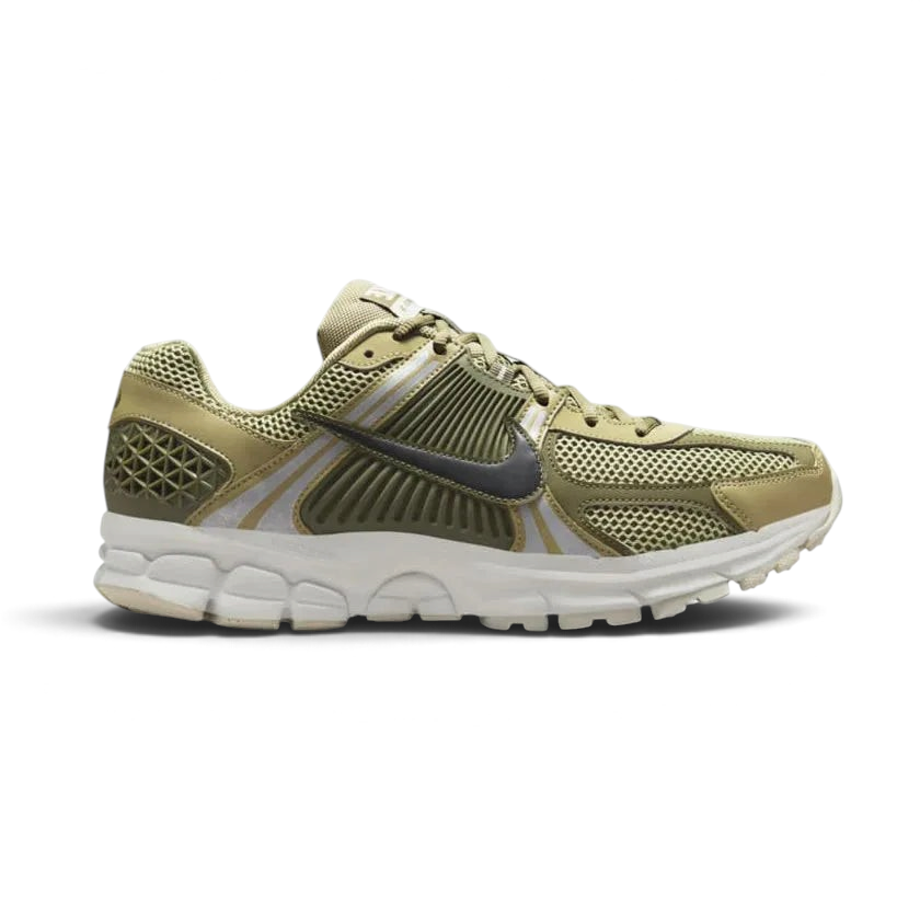 Highlights the high-velocity sweep of the black Nike Swoosh resting against the structural olive plastic side caging, showing the professional visual depth of the layered synthetic leather panels. Main image