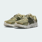 Emphasising the technical, Y2K running silhouette and the professional distribution of the neutral olive and light bone tones.