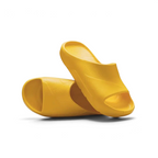 Trade Sports Air Jordan Post Slide in vibrant yellow ochre, featuring a one-piece molded foam asymmetrical design.
