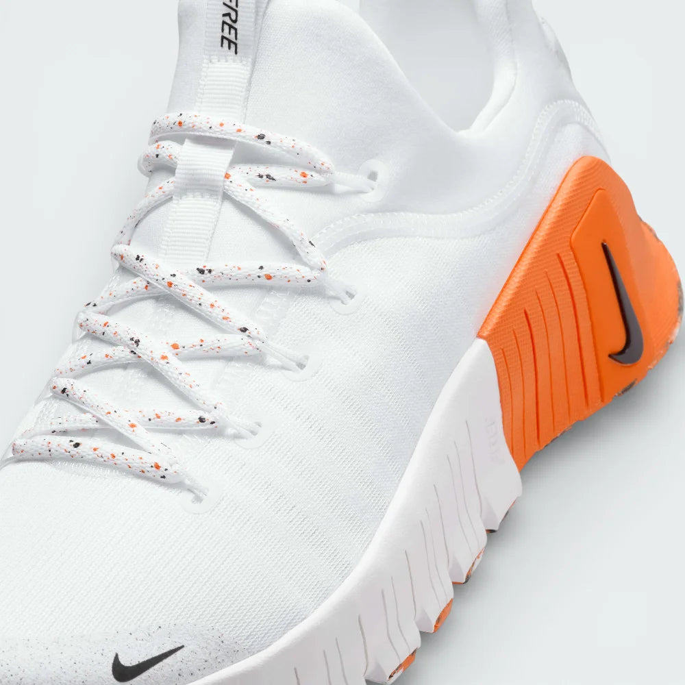 Close-up of the front, showing the flexible mesh construction and the durable eyelets designed for intense training sessions.