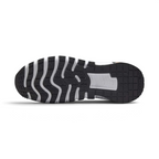View of the outsole of the Nike Free Metcon 5 Men's orange training shoes, showing the multi-directional traction pattern for versatile gym performance.