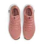 Top-down view of a pair of Nike Free Metcon 5 Men's training shoes in orange, highlighting their athletic silhouette and lace-up closure.