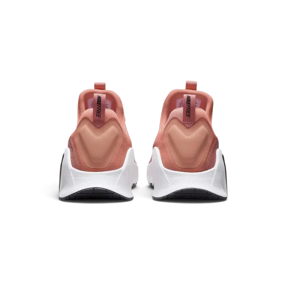 Rear view of the Nike Free Metcon 5 Men's orange training shoes, focusing on the wide, flat heel for lifting stability and subtle branding.
