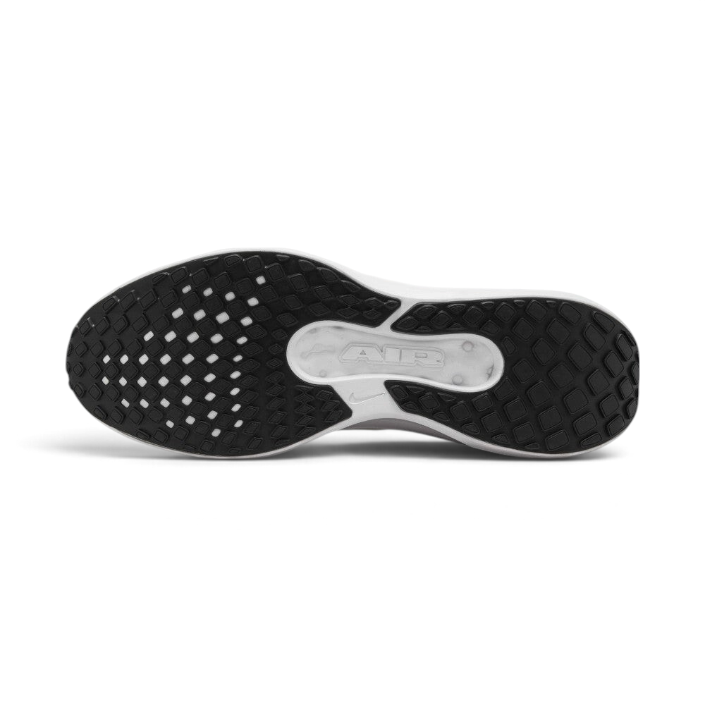 Bottom-up view of the Nike Air Winflo 11 outsole, displaying the black rubber grid traction pattern and a central white groove revealing the embossed "AIR" logo.