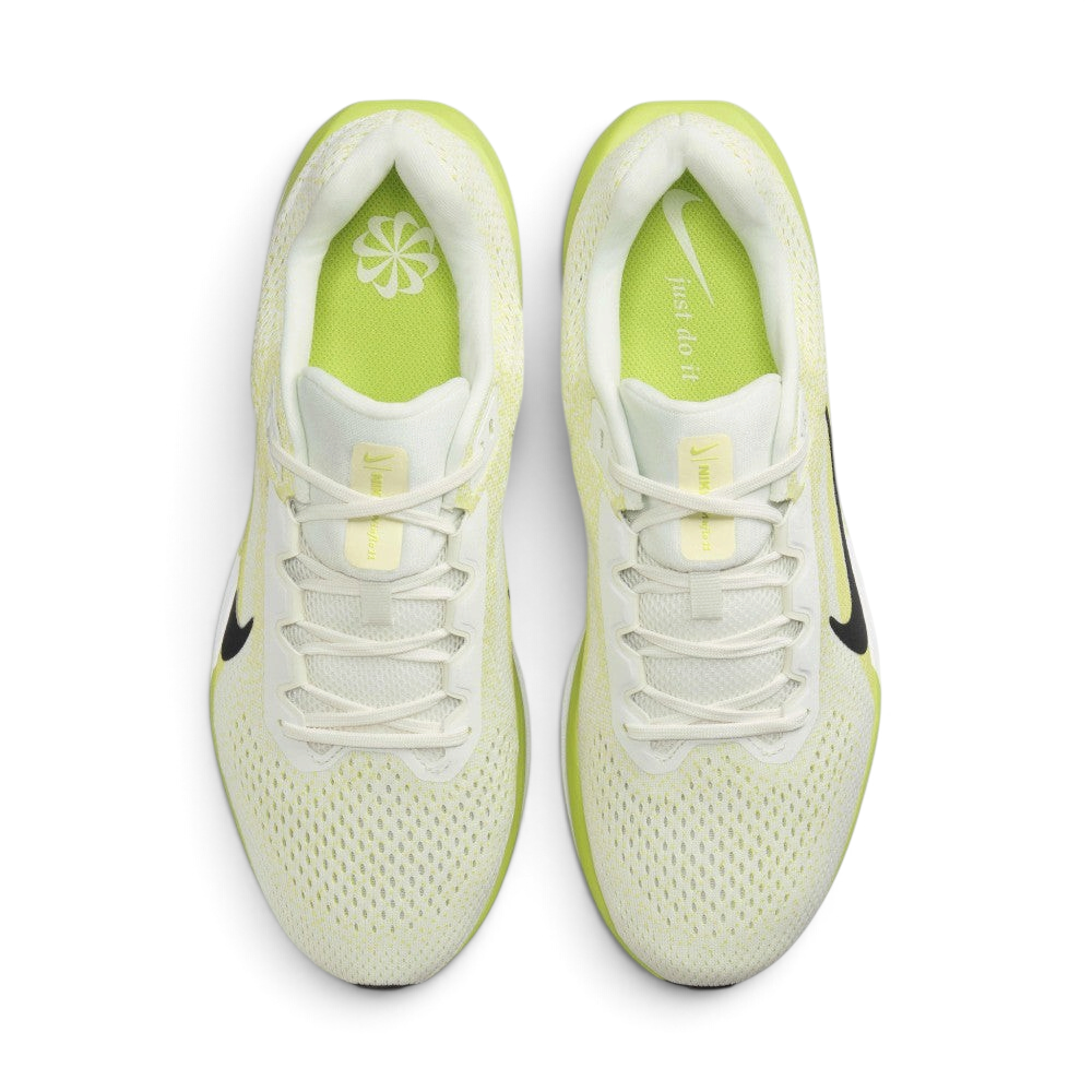 Top-down view of the pair of Nike Air Winflo 11 shoes side by side, showing the off-white laces, sail engineered mesh, and bright lime green insoles printed with white Nike branding.