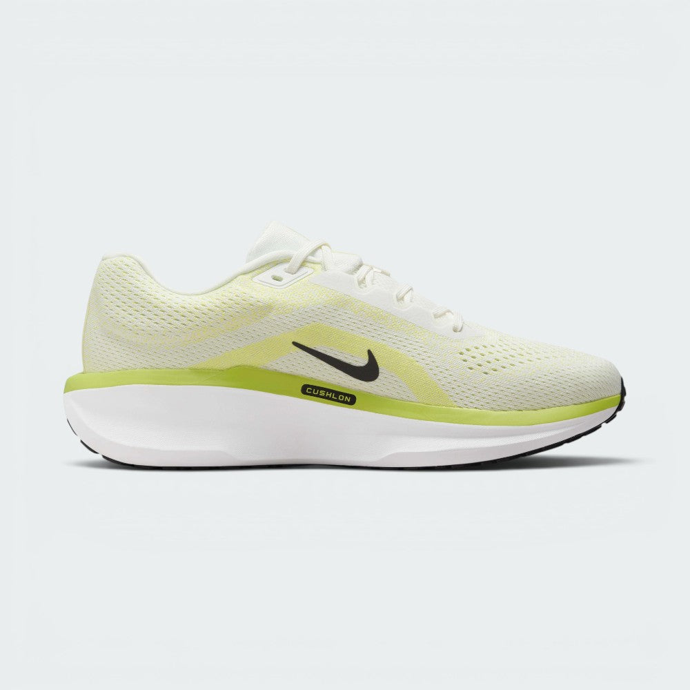 Medial side view of the Nike Air Winflo 11, featuring a smaller black Swoosh near the midfoot and a thin lime green strip accented with black "CUSHLON" branding.