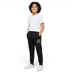 Child wearing a white t-shirt and black pants with text on a white background