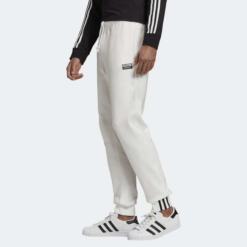 Highlights the tapered leg and the signature stacked logo badge.