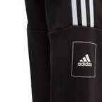 Black Adidas hoodie with logo and three stripes on a light gray background