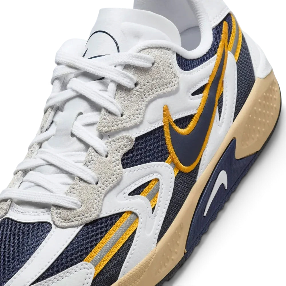 Close-up of the front, showing the protective toe cap and the fine detail of the mesh and synthetic leather materials.