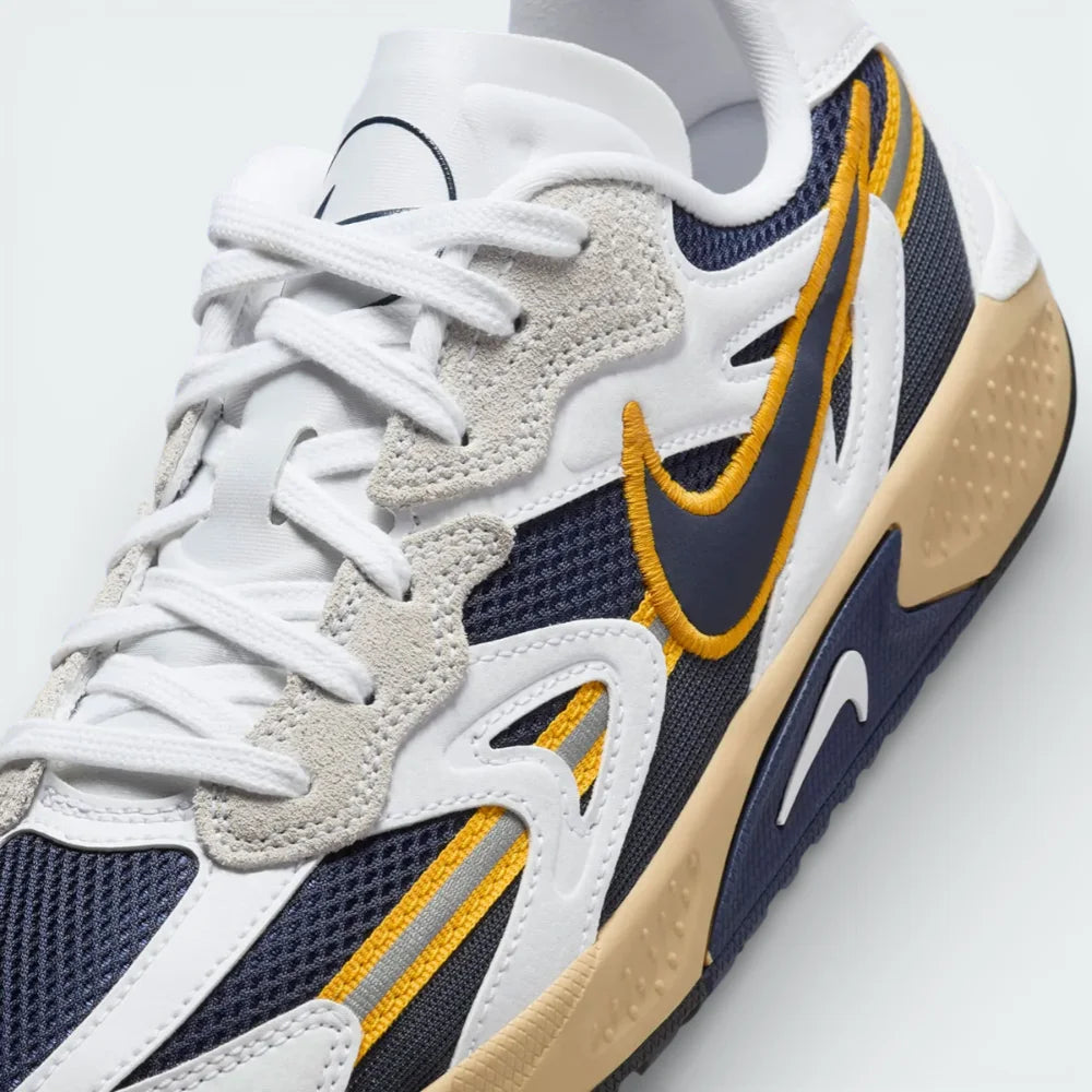 Close-up of the front, showing the protective toe cap and the fine detail of the mesh and synthetic leather materials.