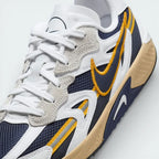 Close-up of the front, showing the protective toe cap and the fine detail of the mesh and synthetic leather materials.