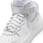 Close-up of Nike Air Force 1 Mid EasyOn Juniors White FN1193-111 laces, leather texture, and branding