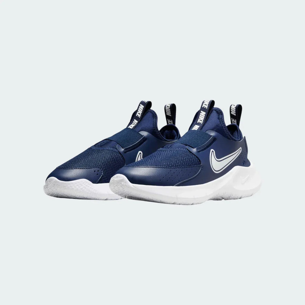 Angled view of two Nike Flex Runner 3 Juniors' navy trainers, side by side, showcasing their flexible design and slip-on style.
