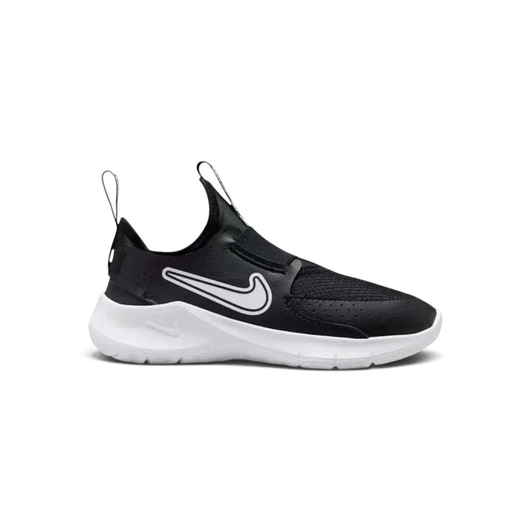 Nike Flex Runner infants slip-on trainers in black and white, side profile showing the stretchy mesh upper and thick white foam sole. Main image