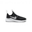 Nike Flex Runner infants slip-on trainers in black and white, side profile showing the stretchy mesh upper and thick white foam sole.