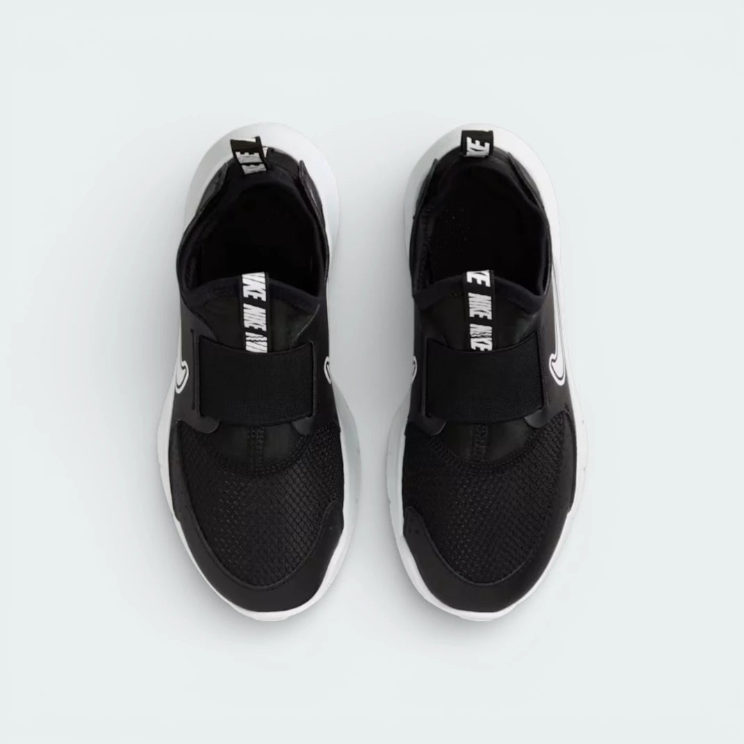 Top-down view of the black trainers, highlighting the elastic straps and the Nike branding on the tongue pull tab.