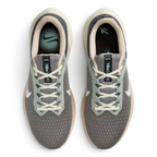 Top-down view of the grey and pewter trainers, highlighting the sleek lacing system and the fine texture of the engineered mesh toe box.