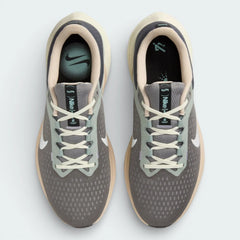 Top-down view of the grey and pewter trainers, highlighting the sleek lacing system and the fine texture of the engineered mesh toe box.