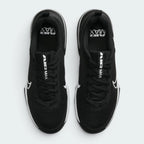 Focuses on the locked-in traditional lacing layout, displaying the perfect symmetry of the black mesh tongue, the tonal lace tracks, and the wide profile of the front toe box matrix.