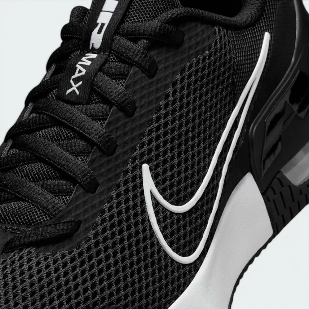 Details the premium seamless reinforcement wrapping the front toe cap protection matrix and the precise tracking of the eyelet lacing lines.