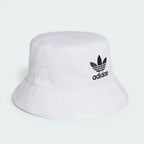 Angle view showing the hat from the front, emphasizing the contrasting embroidered Trefoil logo.