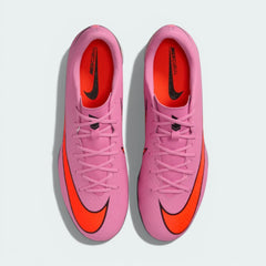 Top-down view of the turf trainers, highlighting the low-cut Vapor silhouette and the chevron texturing across the striking zone.