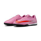 Three-quarter view of the pair, emphasizing the vibrant flamingo pink colourway and the responsive Air Zoom branding.