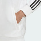 Detailed zoom of the ribbed cuffs and the fabric texture, showing the tight weave of the material and the durability of the French Terry.